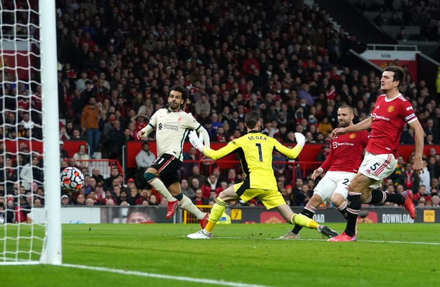Mohamed Salah, left, scores his third goal in Liverpool's 5-0 win at Old Trafford in October 2021