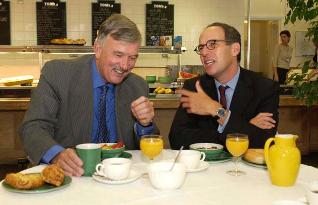  Loyd Grossman and Sir Andrew Foster at a table full of food