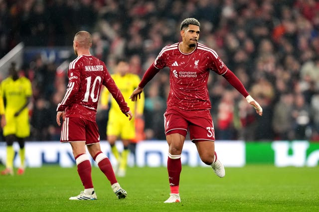 Liverpool’s Ronald Araujo (right) celebrates scoring