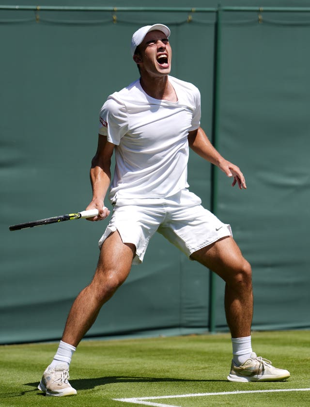Oliver Tarvet reacts to winning a point