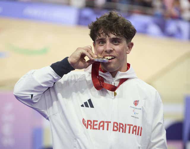 Great Britain’s Archie Atkinson celebrates with the silver medal (ParalympicsGB handout/PA)