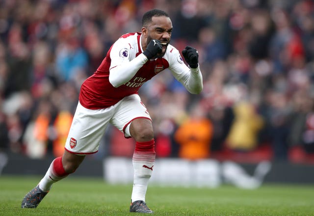 Lacazette scored a late penalty to mark his return from injury with a goal.