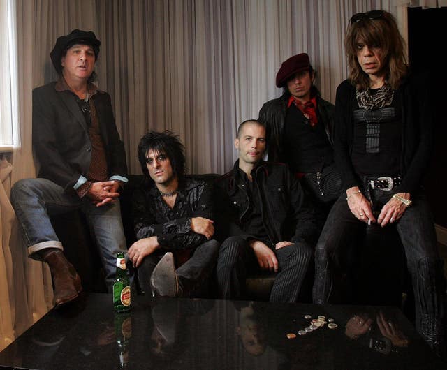 The reformed New York Dolls, left to right, Sylvain Sylvain, Steve Conte, Brian Delaney, Sami Yaffa and David Johansen, in the dressing room at Koko in London