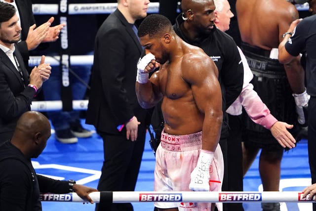 Despite the win, Joshua appeared to injure his nose (Zac Goodwin/PA)