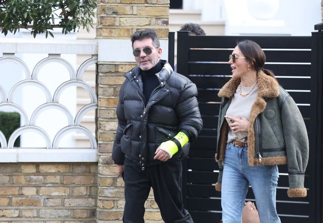 Simon Cowell broken arm