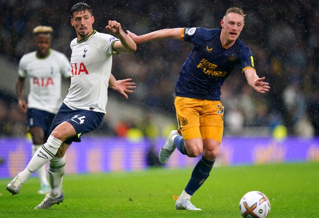 Newcastle’s Sean Longstaff, right, and Tottenham’s Clement Lenglet battle for the ball