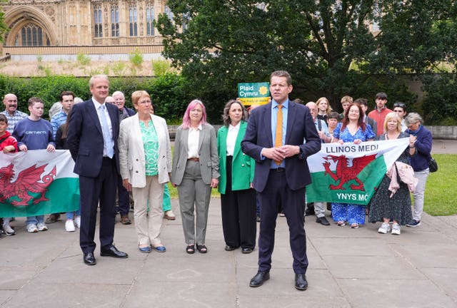 Plaid Cymru Leader Rhun ap Iorwerth (right), joins the four Plaid Cymru MPs from left, Ben Lake, Ann Davies, Liz Saville Roberts and Llinos Medi who won seats in the 2024 General Election 