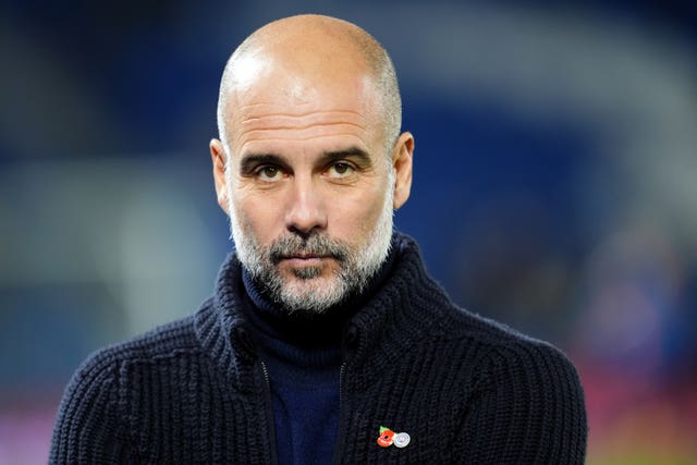 Pep Guardiola stares into the camera