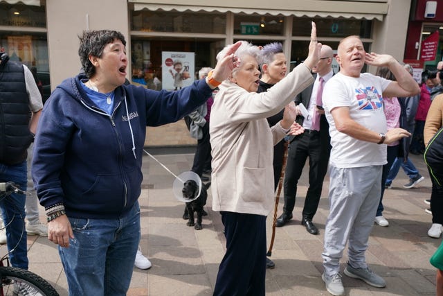 People outside the Reform UK office in Hamilton, Lanarkshire