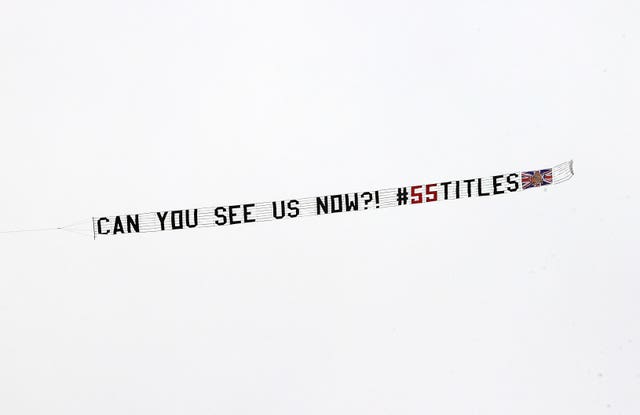 A plane flies over Dundee United's stadium with the message 'Can You See Us Now?' 