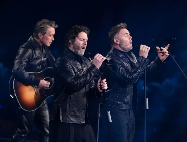 Take That perform during the F1 75 Live launch event