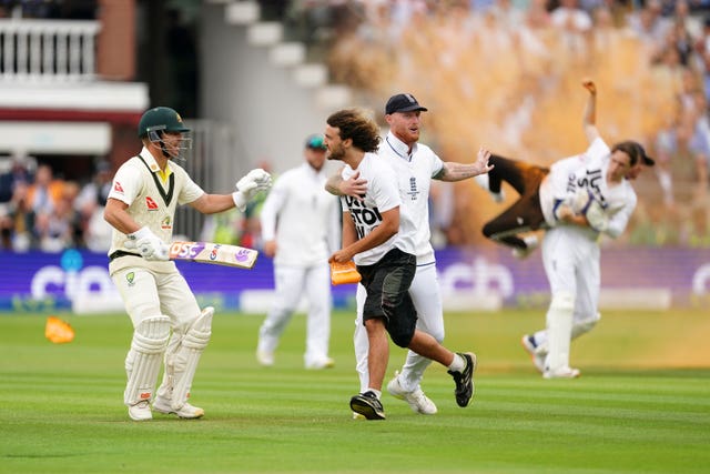 Jonny Bairstow and Ben Stokes try to prevent the protest