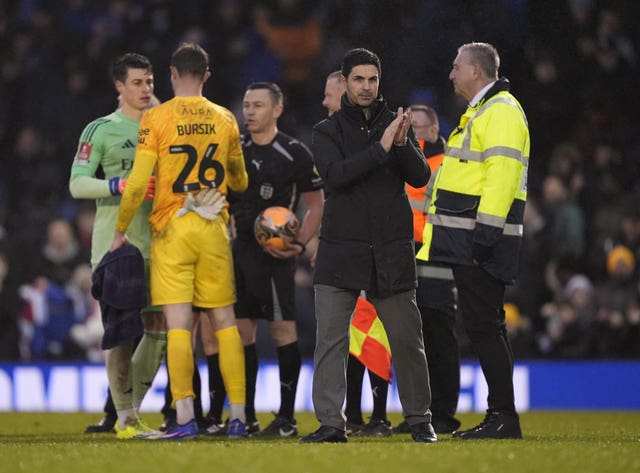 Mikel Arteta applauds the Arsenal fans after victory over Portsmouth 