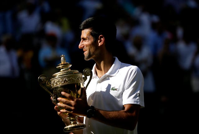 Novak Djokovic gets his hands on a familiar trophy