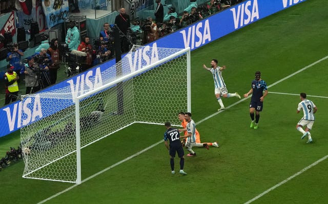 Julian Alvarez, centre, and Lionel Messi, top, celebrate the third goal