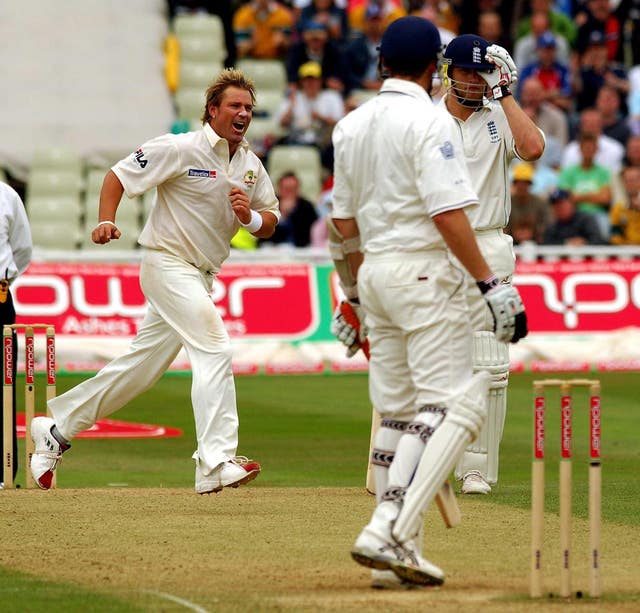 Shane Warne, left, celebrates taking the wicket of England’s Ashley Giles in the 2005 Ashes