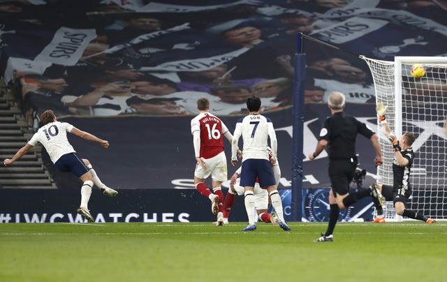 Harry Kane, left, scores Tottenham’s second goal against Arsenal in December 2020
