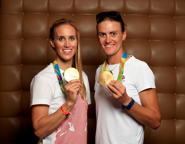 Great Britain’s Helen Glover (left) and Heather Stanning pose with the Olympic gold medals they won in Rio in 2016