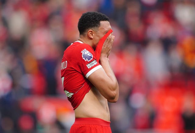 Trent Alexander-Arnold shows his dejection after Liverpool lose 1-0 at home to Crystal Palace to lose ground in the Premier League title race (Peter Byrne/PA)