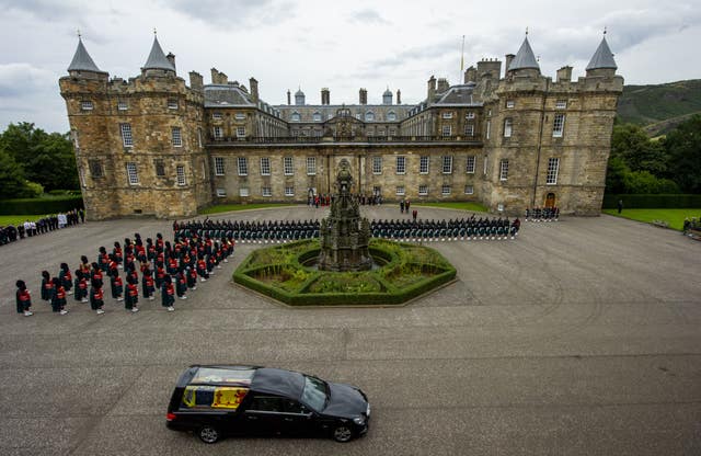 The hearse carrying the coffin of Queen Elizabeth II arrived at Palace of Holyroodhouse, Edinburgh on Sunday after a six hour journey from Balmoral (PA)