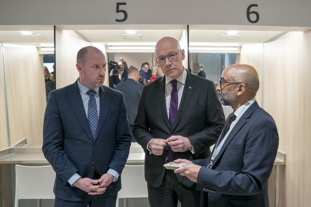 Neil Gray, left, John Swinney, centre, and Dr Saket Priyadarshi