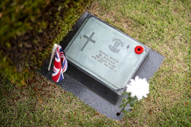 The princess's single white chrysanthemum at the grave of Private Martin Hogan who died July 14 1952 aged 19 