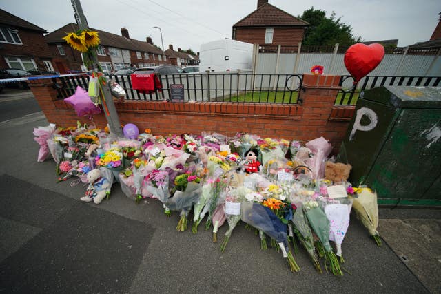 Flowers near the scene in Kingsheath Avenue, Knotty Ash, Liverpool, where nine-year-old Olivia Pratt-Korbel was fatally shot 