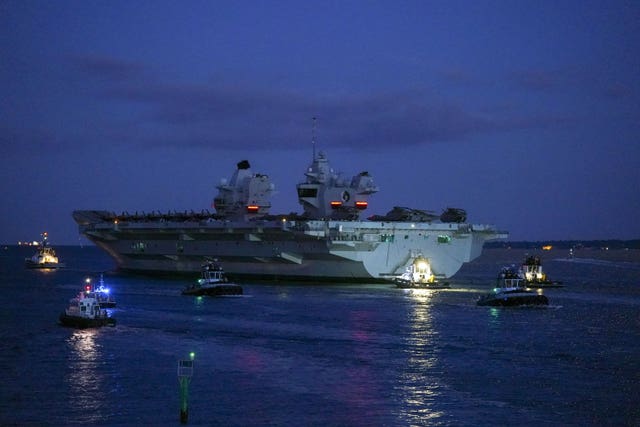 HMS Queen Elizabeth departing HM Naval Base, Portsmouth (Steve Parsons/PA)