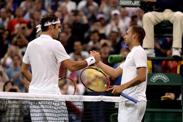 Dan Evans (right) and Roger Federer were frequent practice partners
