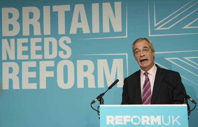 Nigel Farage speaking from a Reform lectern