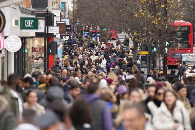 People on Oxford Street in London (James Manning/PA)