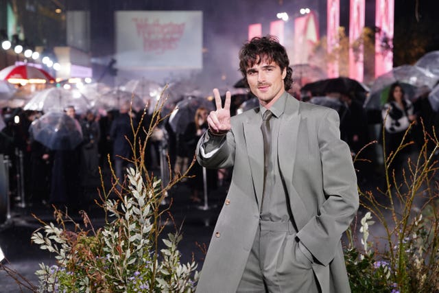 Jacob Elordi making a peace sign