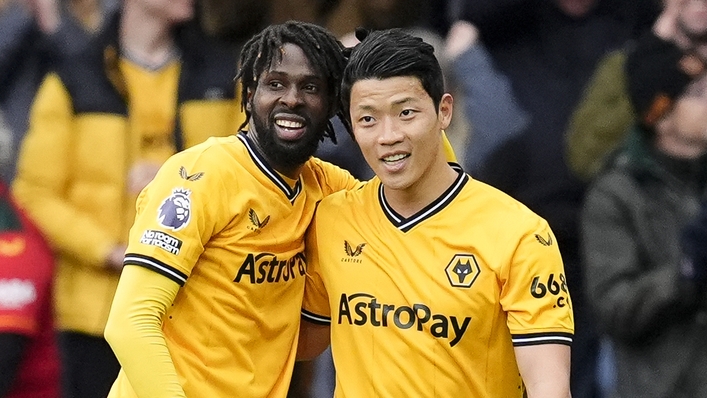 Wolves striker Hwang Hee-Chan, right, celebrates with team-mate Boubacar Traore after scoring against Luton (Nick Potts/PA)