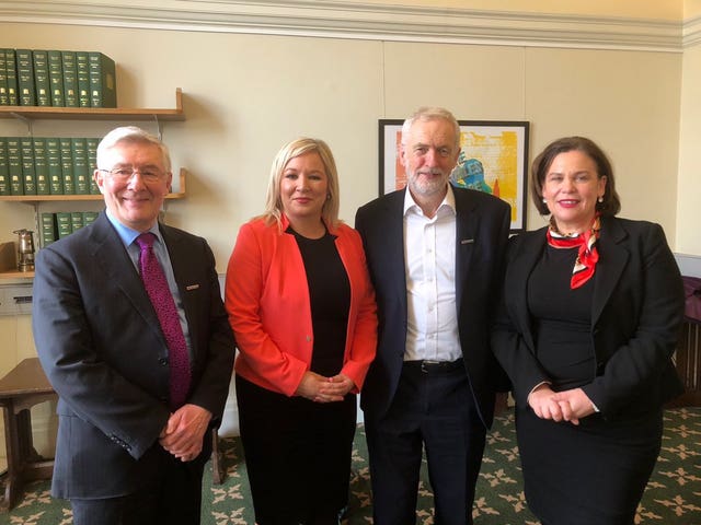 Tony Lloyd, Shadow Secretary of State for Northern Ireland, left to right, Sinn Fein leader Michelle O’Neill, Labour leader Jeremy Corbyn and Sinn Fein leader Mary Lou McDonald at a meeting in Westminster (@moneillsf handout/PA)