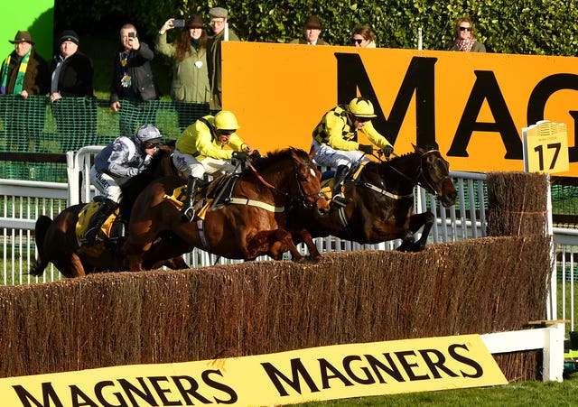 Al Boum Photo (far side) winning his second Gold Cup