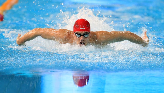 James Guy finished second to Chad le Clos of South Africa in the men's 100m butterfly