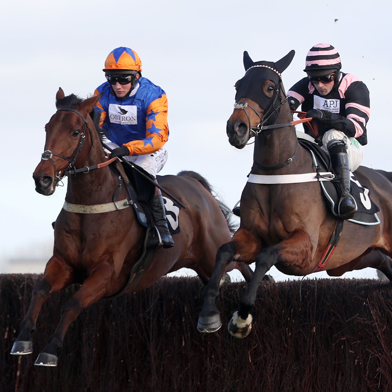 Knocknanuss (left) on his way to winning at Newbury