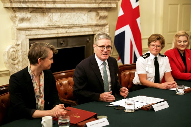 Prime Minister Sir Keir Starmer sits at a table at 10 Downing Street