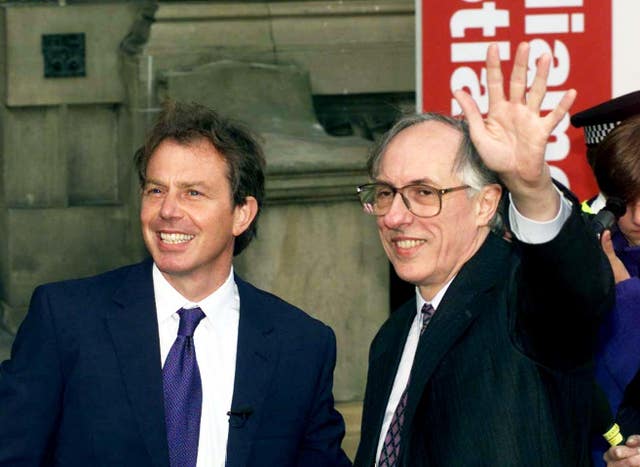 Tony Blair and Donald Dewar celebrating the win in the referendum for a Scottish Parliament