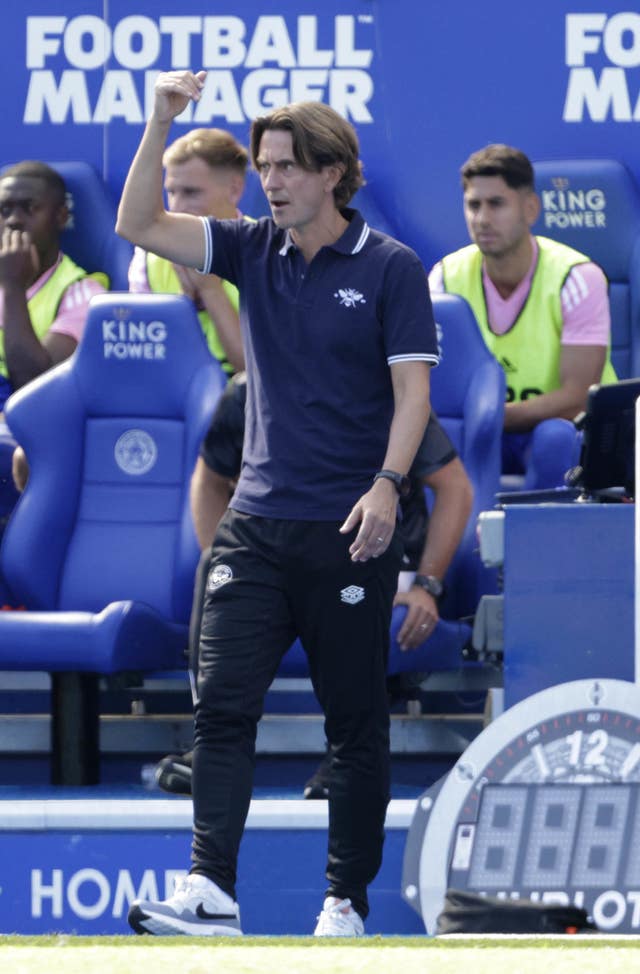 Thomas Frank in front of the fourth official's board during Brentford's game against Leicester