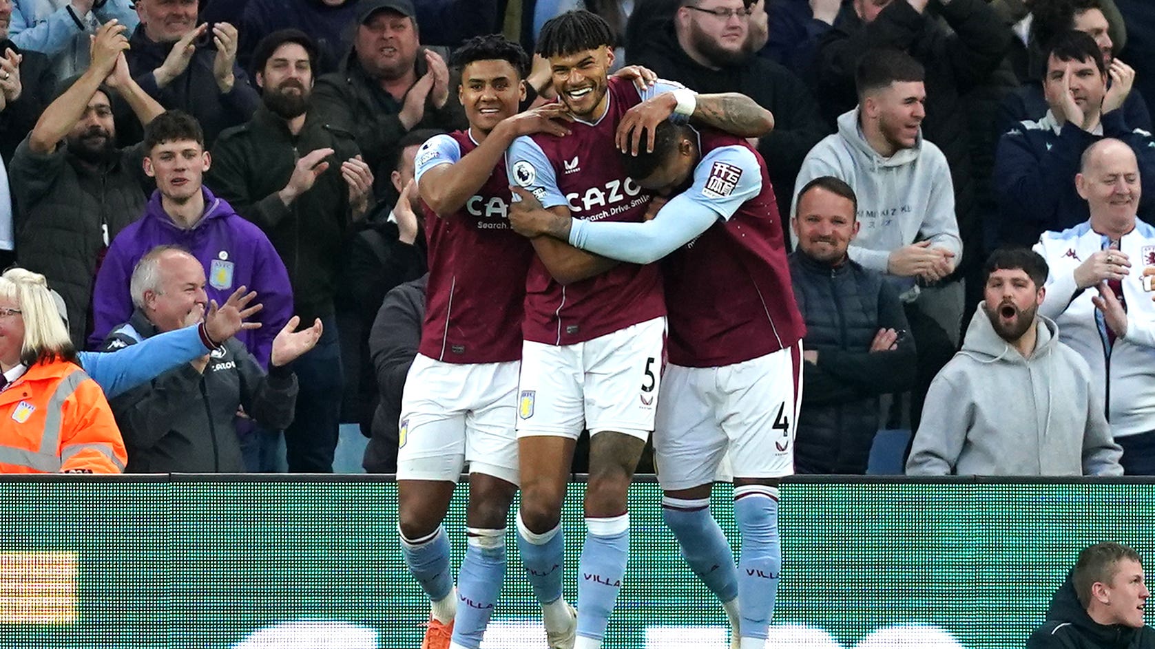Aston Villa’s Tyrone Mings (centres) celebrates scoring their side’s first goal of the game with team-mates during the Premier League match at Villa Park, Birmingham. Picture date: Tuesday April 25, 2023.