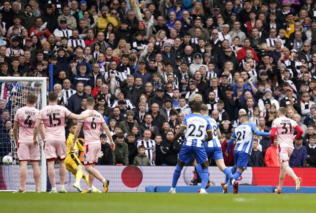 Deniz Undav (second right) scores the opener