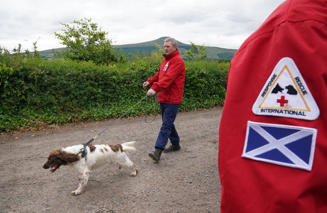 John Miskelly with his dog Bracken at his home in Falkland, Fife