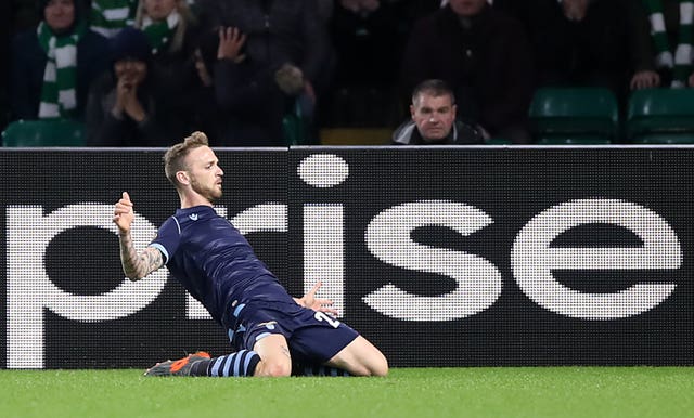 Manuel Lazzari celebrates opening the scoring for Lazio 