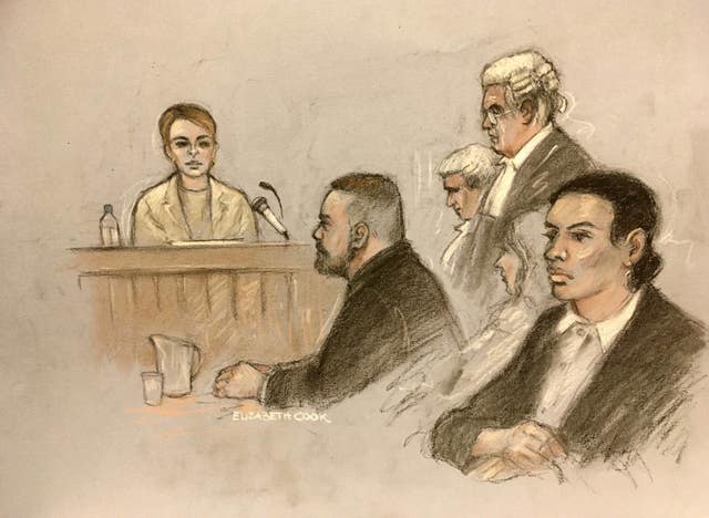 Court artist sketch by Elizabeth Cook of Coleen Rooney, watched by her husband Wayne, as she gives evidence at the Royal Courts Of Justice, London