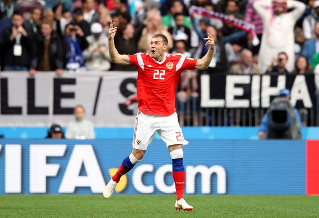 Russia’s Artem Dzyuba celebrates scoring his side’s third goal