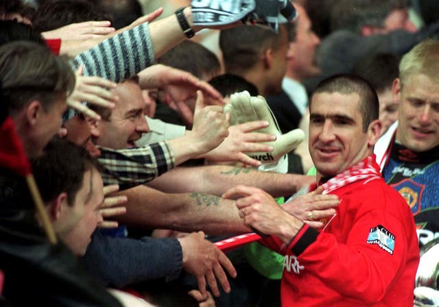 Eric Cantona is greeted by fans after Manchester United's 1996 FA Cup win