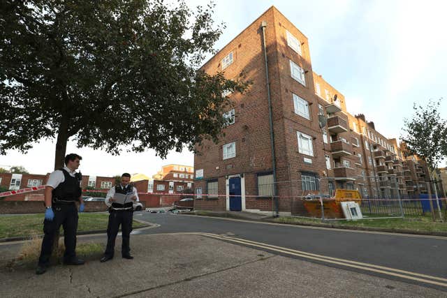 Police officers outside Landor House