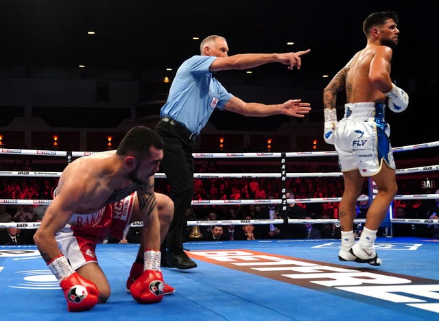 Shavkat Rakhimov, left, recovered strongly after being knocked down in the second round