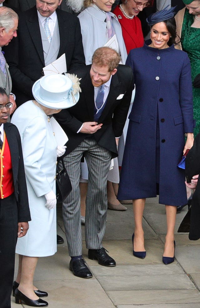 Harry and Meghan with the Queen at Princess Eugenie's wedding